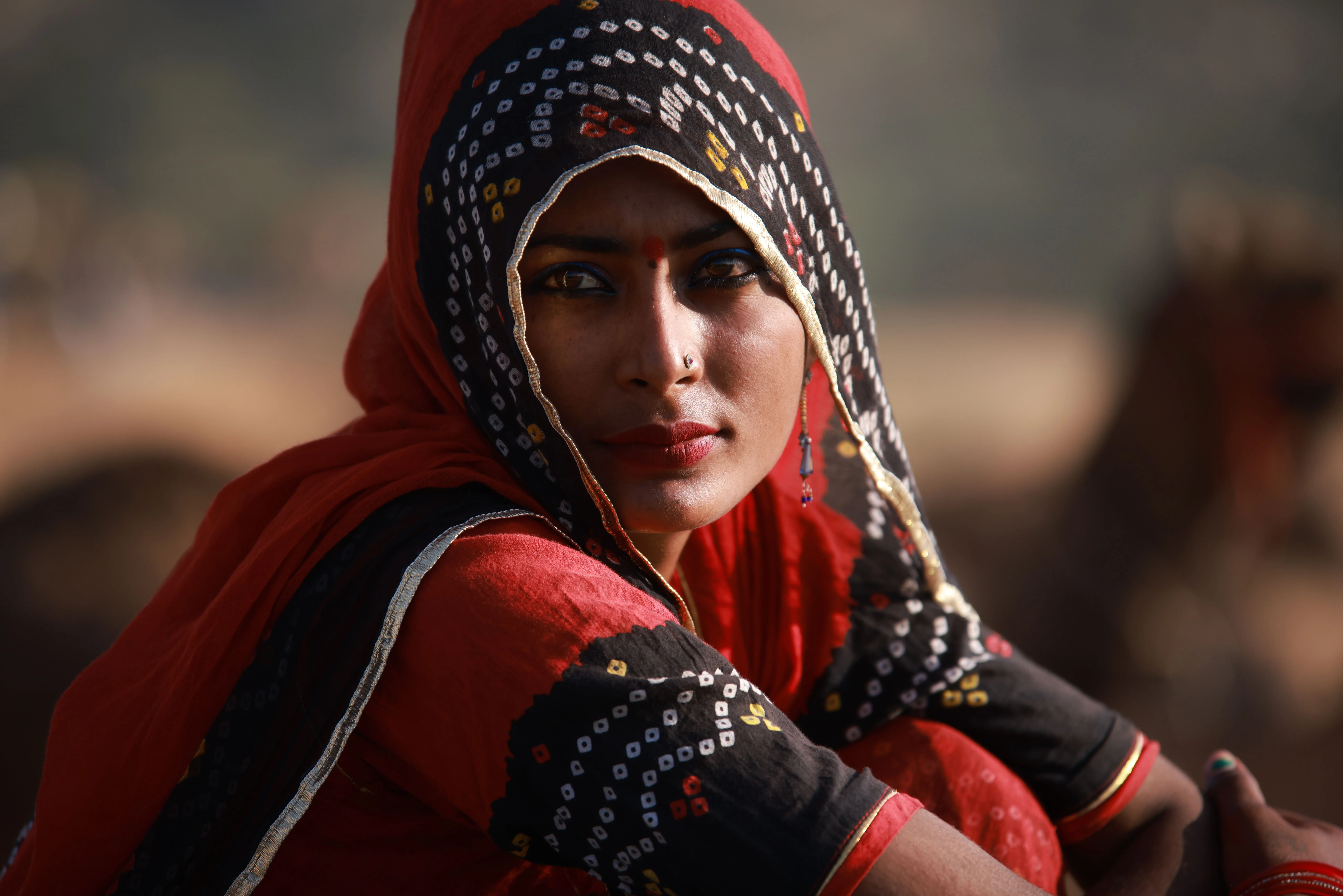 Woman in traditional dress — culture, art and social balance in regenerative tourism